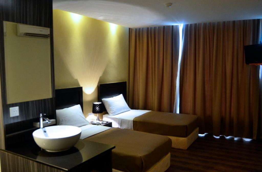 Zotel Business & Leisure Hotel كوشنج الغرفة الصورة