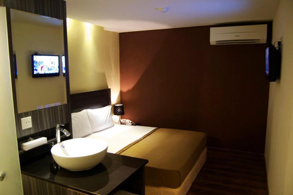 Zotel Business & Leisure Hotel كوشنج الغرفة الصورة
